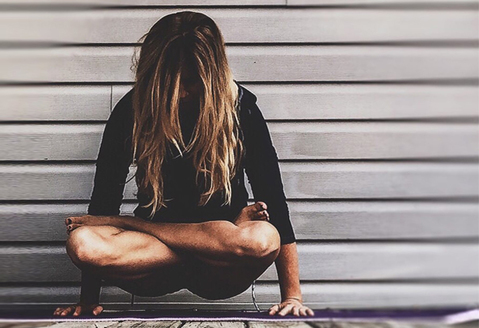 woman holding pose above ground best artistic yoga photography