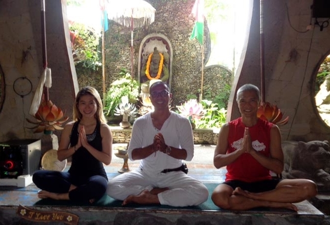 three people in sitting prayer pose Yoga Studios Ubud Classes Practice Bali