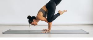 Yogi practicing Fallen Angel Pose Devaduuta Panna Asana
