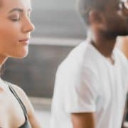 3 people sitting eyes closed vipassana bali silent retreat meditation