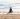 woman meditating in front of ocean 5 elemental meditation elements air water space earth fire vipassana buthas technique script