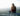 womaN SITTING OUTDOOR ON A ROCK how to get into a meditative state, how to enter easiest way to get into deep state meditation