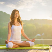 woman sitting in lotus pose yoga benefits for skin benefits of yoga for skin for healthy skin for clear skin