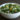 raw kale salad with feta, pine nuts, and cranberries