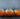 persimmon and pomegranate salad with arugula and hazelnuts
