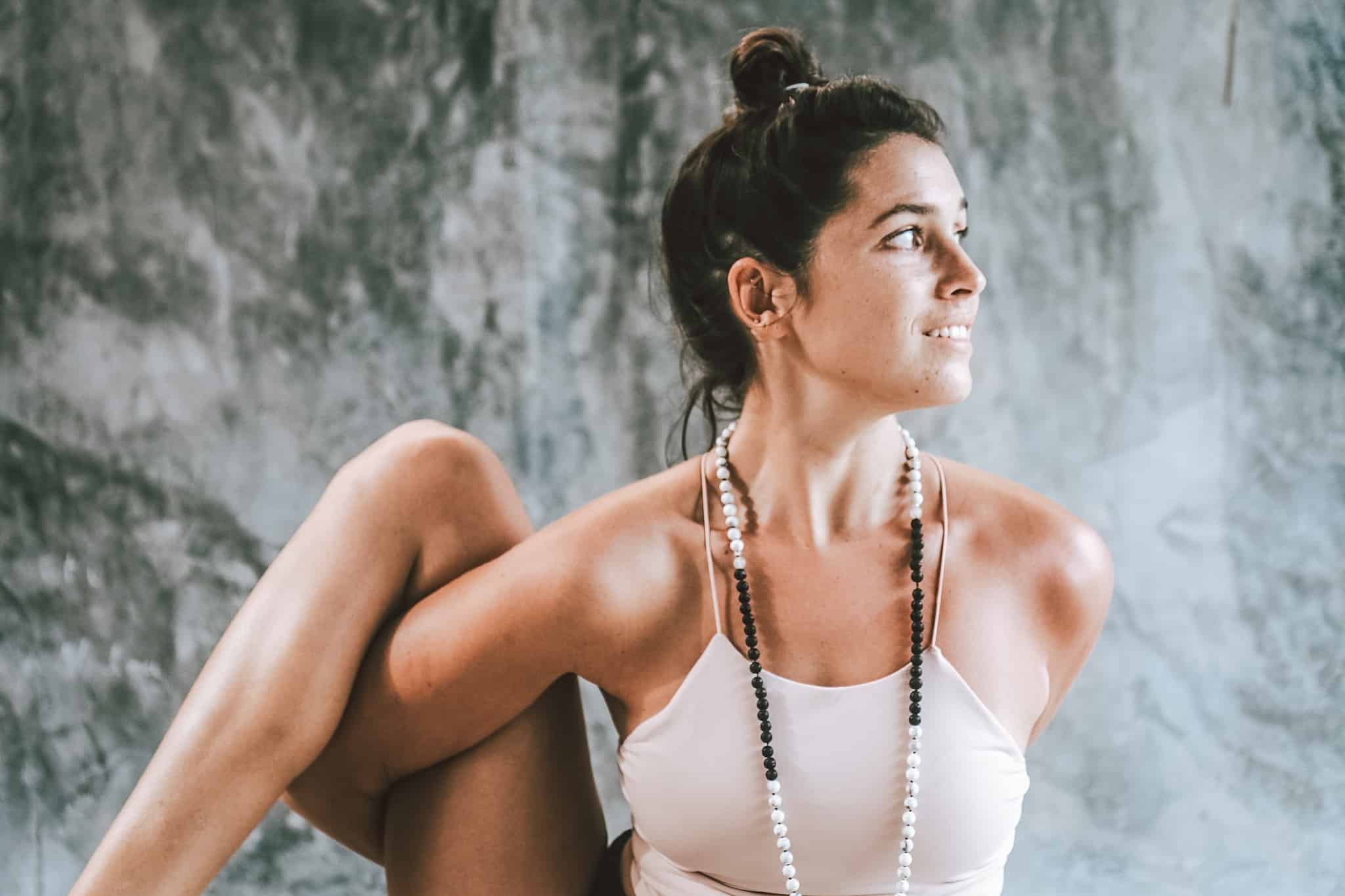 brunette woman in yoga pose trauma stress anxiety