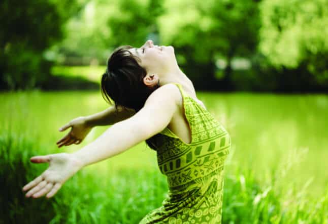 woman opening arms outdoor breathing Recovery Addiction with the Yoga Sutras Freedom from Addiction