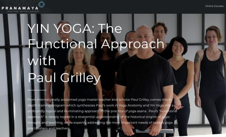 group of people dressed in black Yoga Certification Programs Online