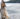 woman walking on beach with one piece outfit loft yoga jumpsuit wide leg casual