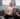 3 people talking on coach apartment couple therapy therapist marriage relationship