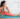dark hair woman hip opening yoga pose crying during release meditation