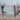 yoga group class by the beach Yoga instructor assisting studentsdoes yoga burn calories? how many calories does yoga burn yoga calories burned hot calculator