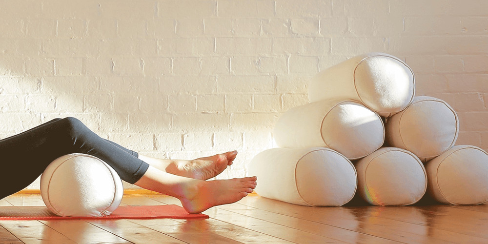 bolsters yoga block exercises
how to use yoga blocks
yoga blocks use
yoga block stretches
restorative yoga props
restorative yoga poses with props
yoga exercises