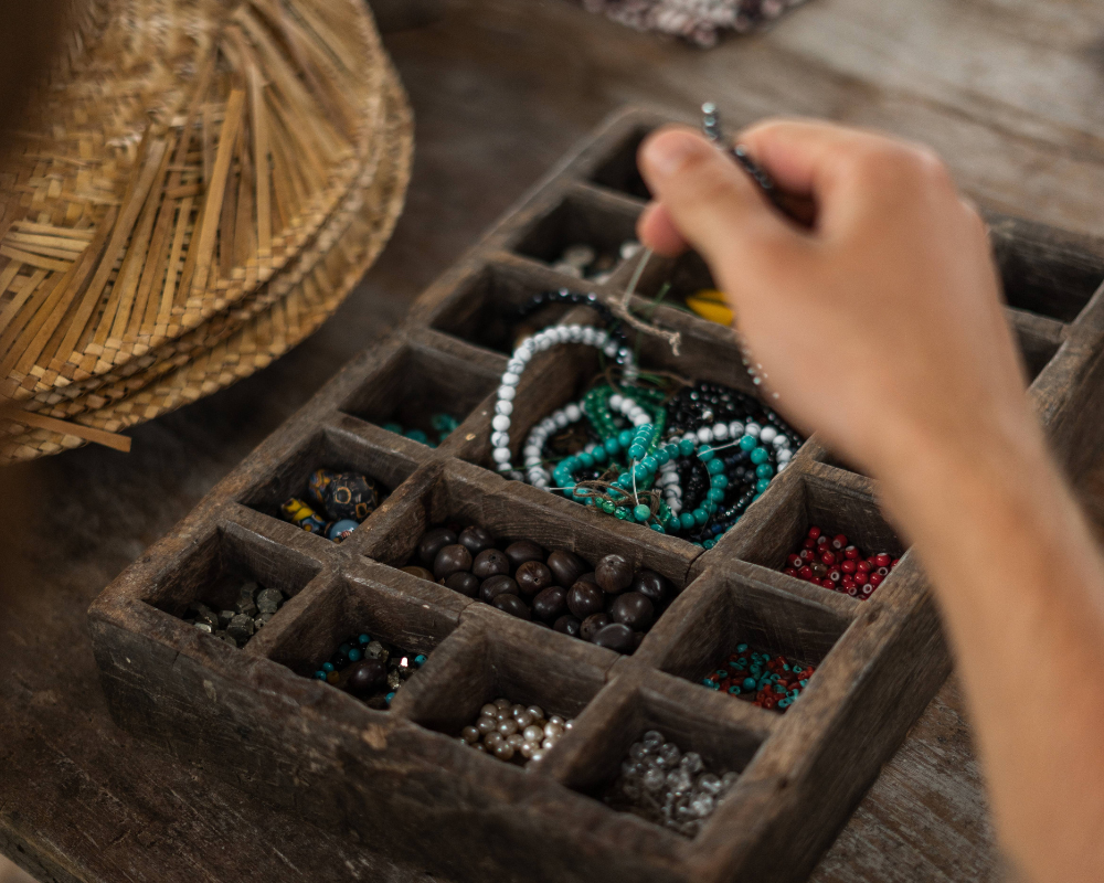Costa Rican wellness retreat offering a handcraft and yoga workshop, with attendees practicing yoga poses and creating art