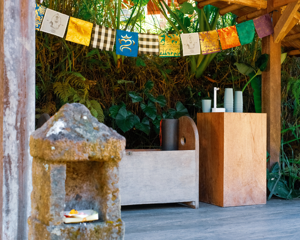Creative and mindful workshop in Costa Rica, with yoga practitioners molding clay, connecting breath with artistry
