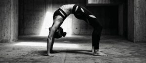 Man seated in meditation embodying the spiritual roots of yoga practice