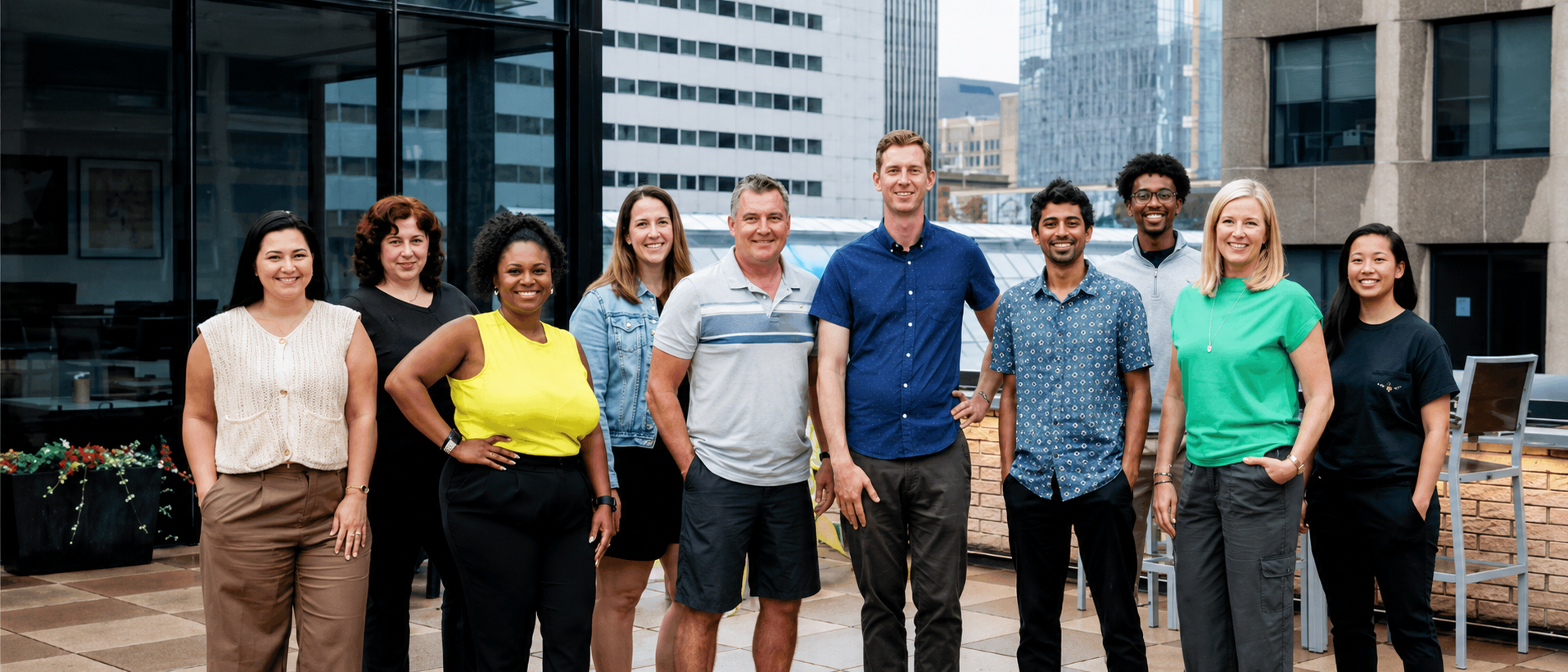 The OfferingTree team, including co-founders Chris Appiah, Alex Haley, and Tom McCook, standing together at the company's headquarters.