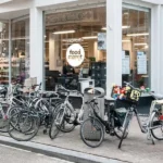 Entrance to Ekoplaza Foodmarqt organic supermarket in Amsterdam, known for its fresh local and organic food.